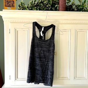 Lululemon tank for Peloton, New With Tags, Size 10. Black and gray color tones.